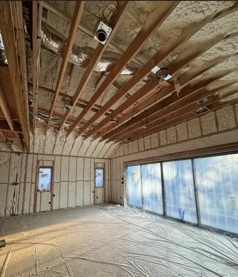 Interior walls and ceiling insulated with spray foam during new construction in West Modesto